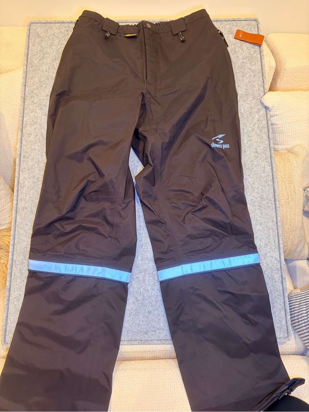 Womans Showers Pass  Waterproof Black Rain Pants with Reflective Blue Trim.